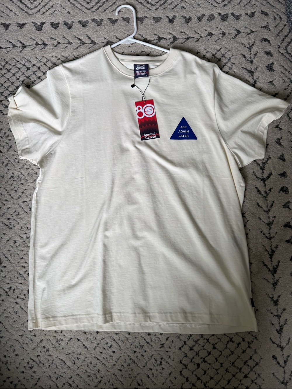 Rowing Blazers Cream Tee with Blue Triangle Graphic
